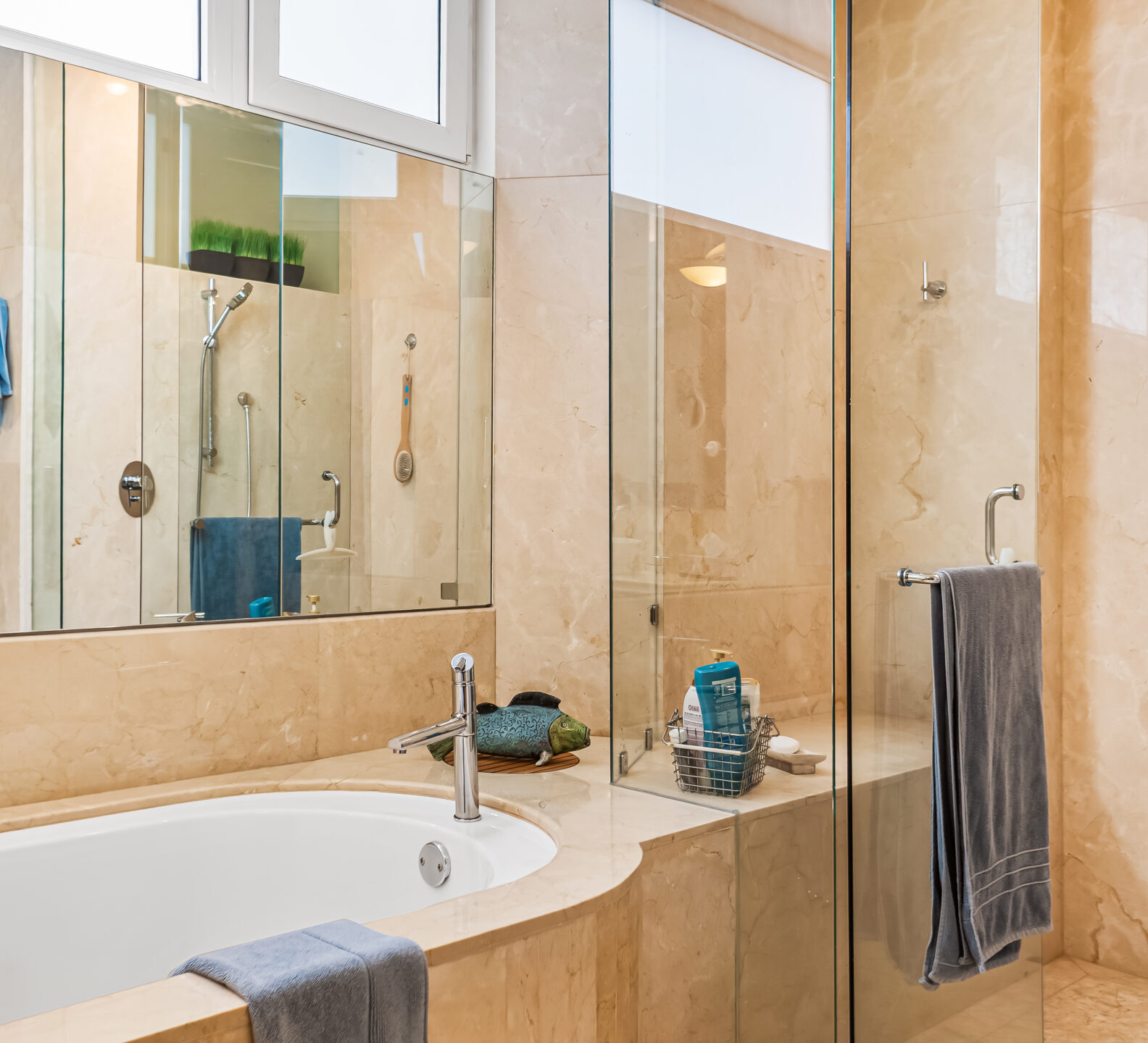 SDM Arco Major 4-24 Bathroom with a soaking tub, glass shower enclosure, and stone finishes